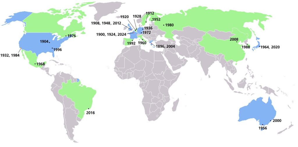 Mapa-múndi mostrando as cidades-sede de todas as edições dos Jogos Olímpicos de Verão, com Los Angeles destacada em azul (Mapa de referência com o histórico de sedes dos Jogos Olímpicos de Verão.)
